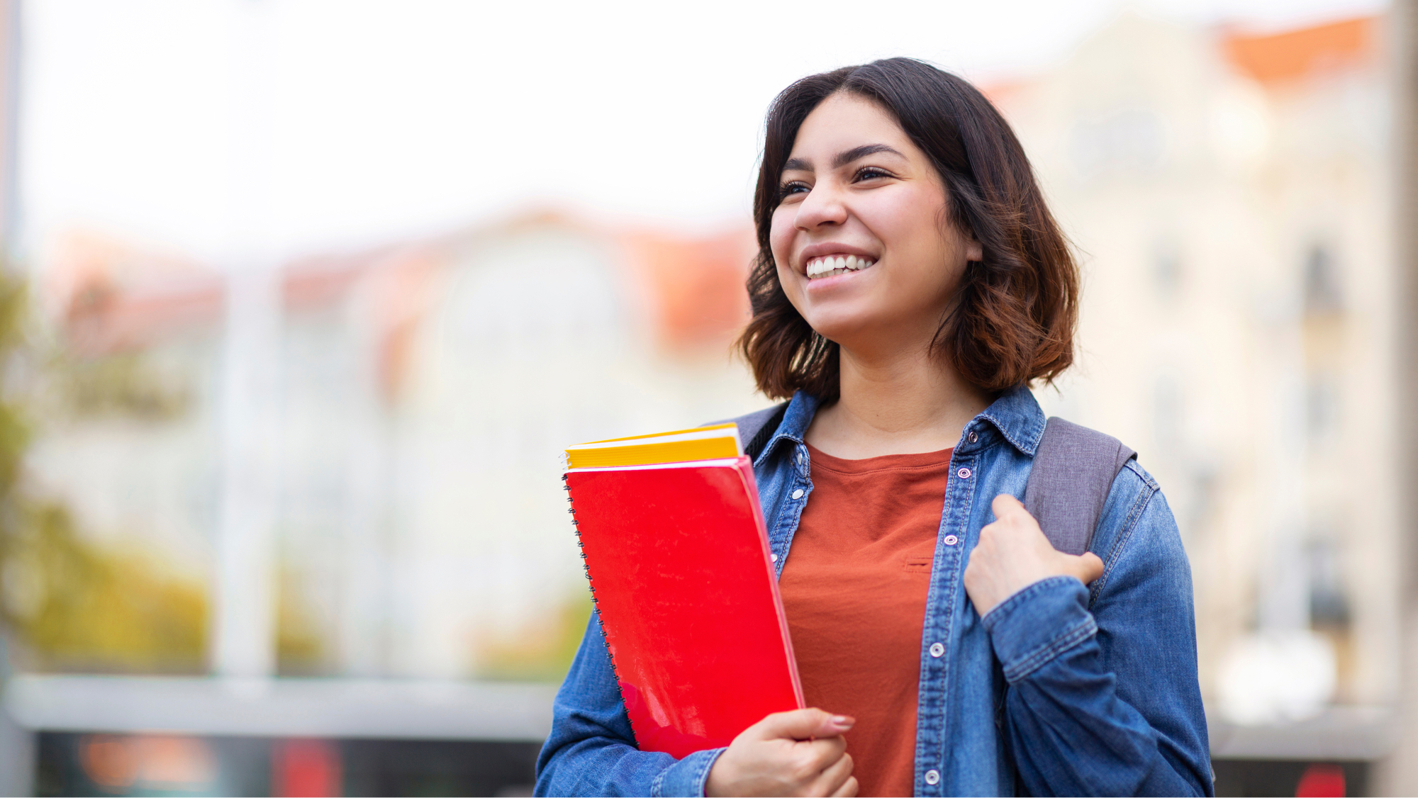 woman holding notebook